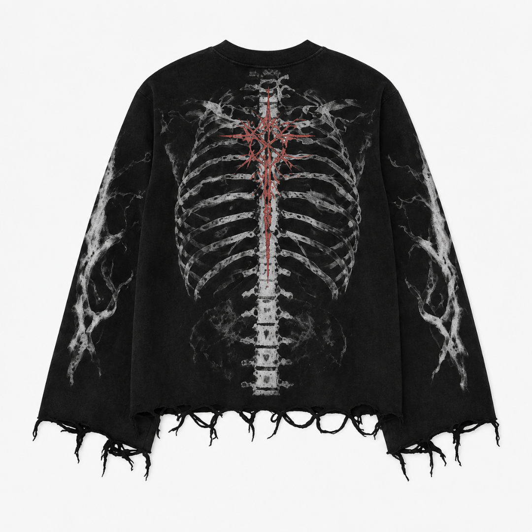 A black oversized long-sleeve top with a distressed, frayed hem, featuring a large white and gray rib cage graphic on the front with a red cross detail at the center.