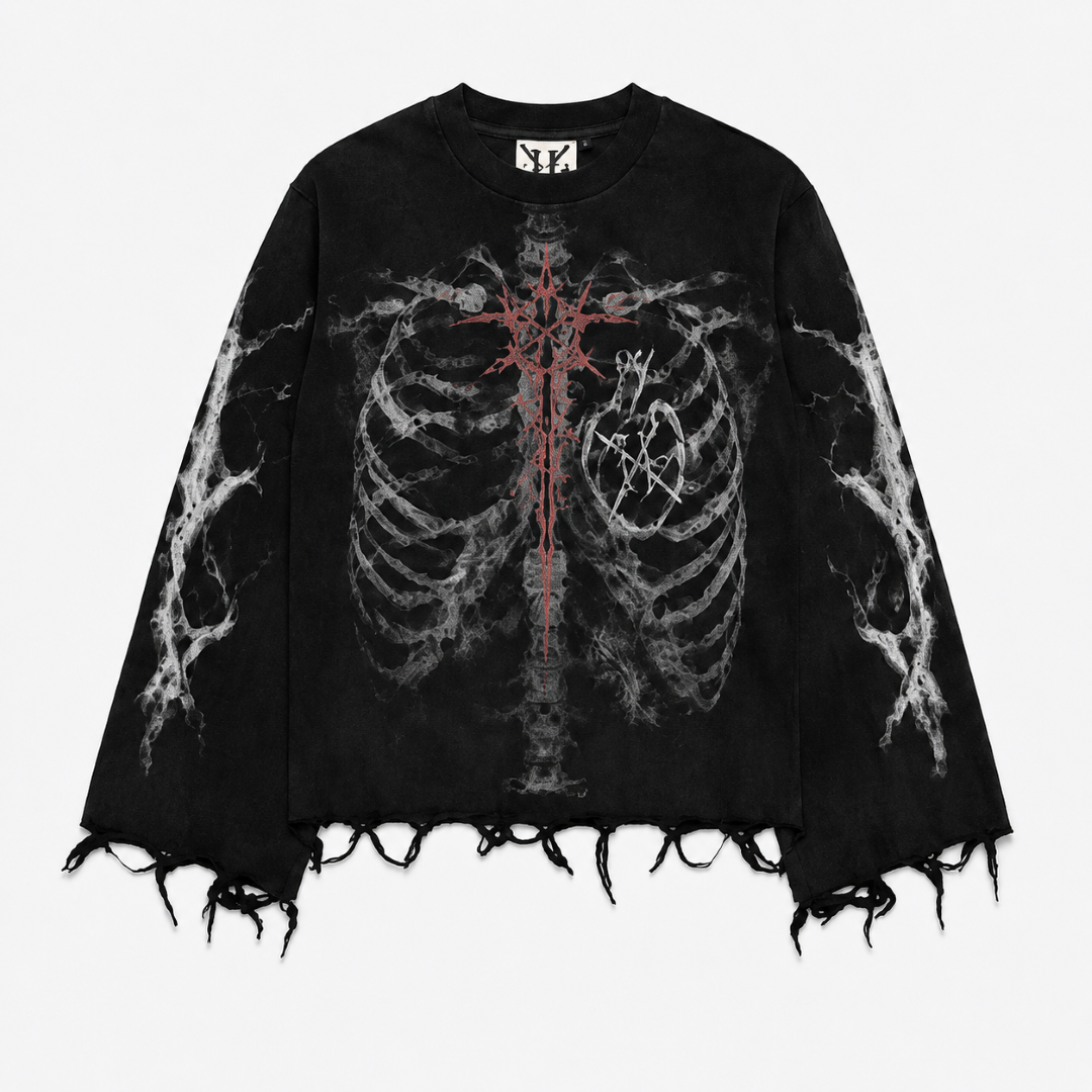 A black long-sleeve t-shirt with a distressed, frayed hem, featuring a graphic print of a white and gray rib cage and a red cross on the chest, displayed against a light gray background.